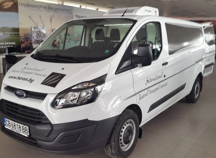White Ford funeral transport vehicle belonging to Haron Funeral Agency